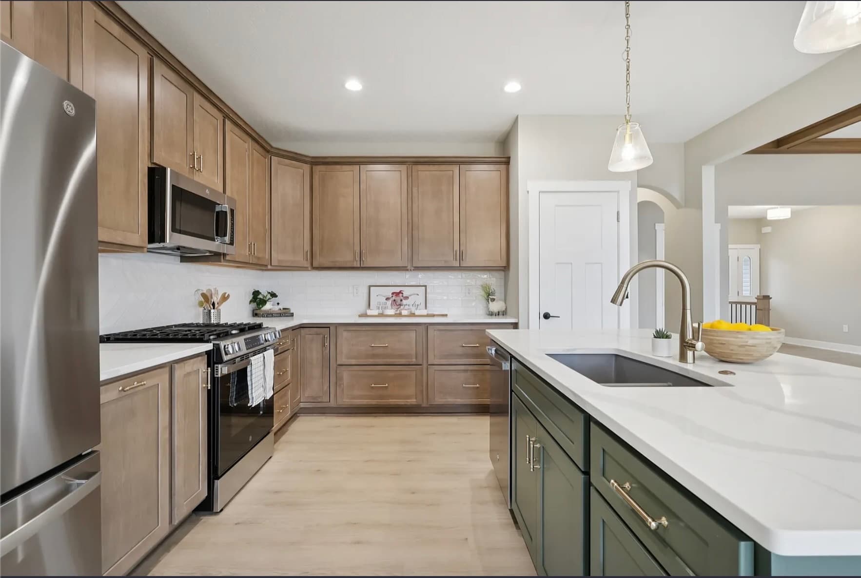 Open kitchen and island in a Henderson Homes build