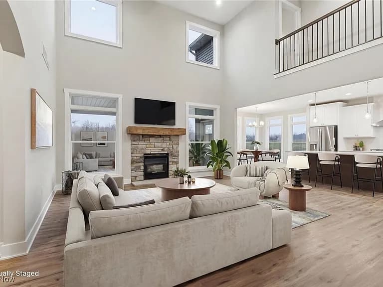 Living room with fireplace in a Henderson Homes build